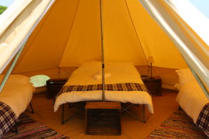 Glamping bell tent with beds and bedding